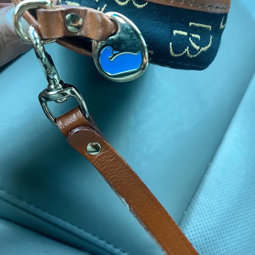 Dooney & Bourke Black and Tan Clutch with silver Accents - Picture 4 of 9